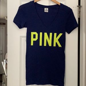 Navy blue shirt with yellow lettering